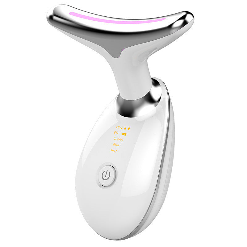White neck and face massager, side view