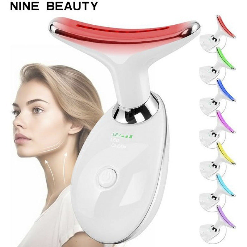 White neck and face massager with red LED light